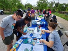 pictures from growth center 2023. Youth at the registration table.